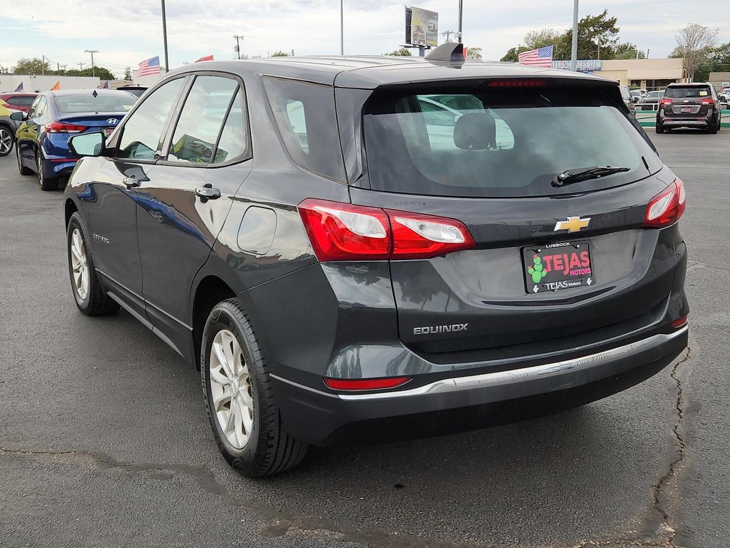 2018 Nightfall Gray Metallic - G7Q /Medium Ash Gray - H72 Chevrolet Equinox LS (2GNAXHEV1J6) with an 1.5L I-4 gasoline direct injection, DOHC, VVT variable valve control, intercooled turbo, regular unleaded, engine with 170HP engine, located at 4110 Avenue Q, Lubbock, 79412, 33.556553, -101.855820 - Photo#2