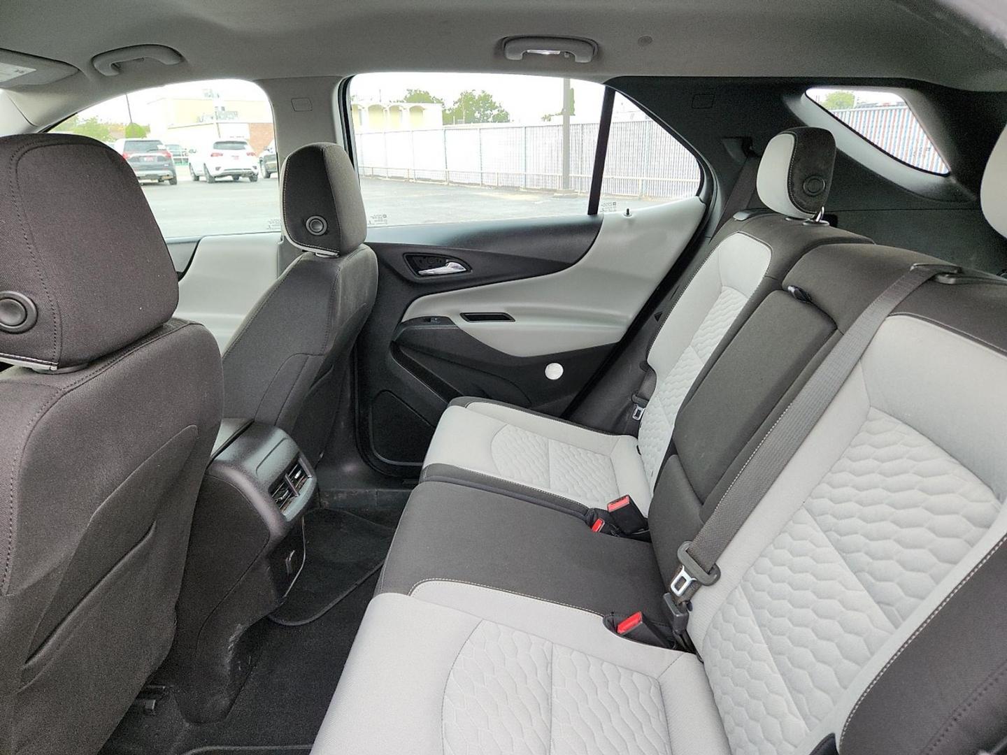 2018 Nightfall Gray Metallic - G7Q /Medium Ash Gray - H72 Chevrolet Equinox LS (2GNAXHEV1J6) with an 1.5L I-4 gasoline direct injection, DOHC, VVT variable valve control, intercooled turbo, regular unleaded, engine with 170HP engine, located at 4110 Avenue Q, Lubbock, 79412, 33.556553, -101.855820 - Photo#4