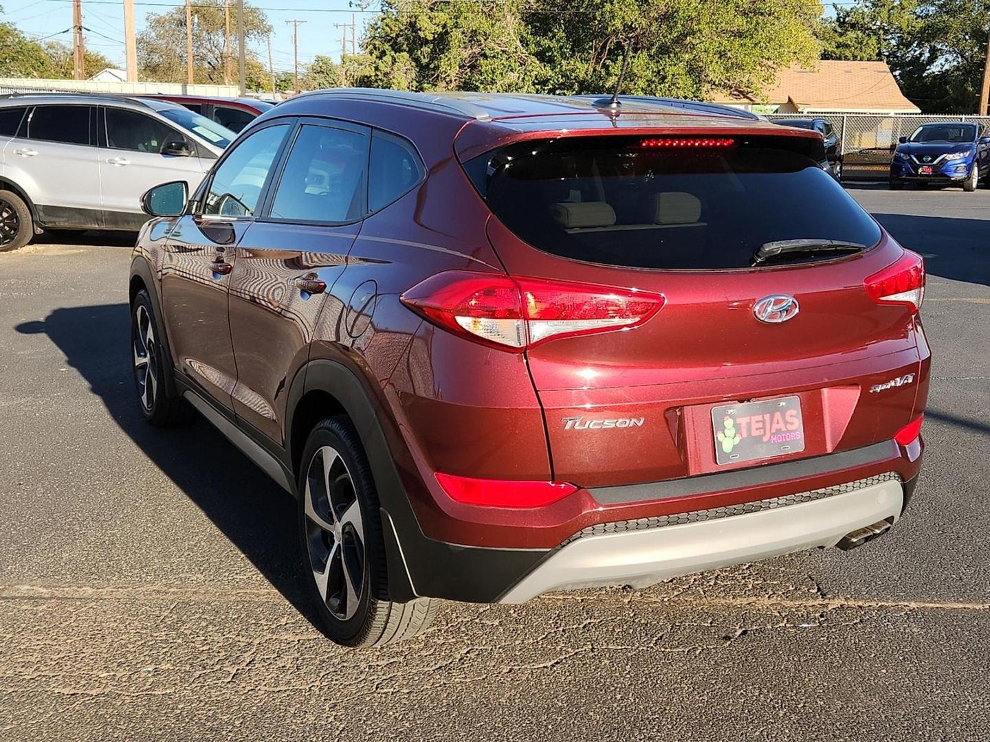 2017 RED Hyundai Tucson Sport (KM8J33A21HU) with an 1.6L I-4 gasoline direct injection, DOHC, D-CVVT variable valve control, intercooled turbo, regular unleaded, engine with 175HP engine, located at 4110 Avenue Q, Lubbock, 79412, 33.556553, -101.855820 - 11/06/2025 KEY IN ENVELOPE GOD - Photo#2