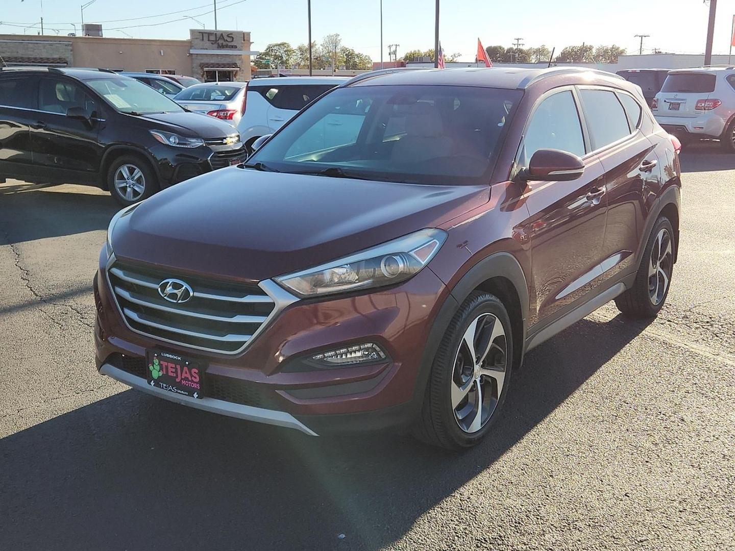 2017 RED Hyundai Tucson Sport (KM8J33A21HU) with an 1.6L I-4 gasoline direct injection, DOHC, D-CVVT variable valve control, intercooled turbo, regular unleaded, engine with 175HP engine, located at 4110 Avenue Q, Lubbock, 79412, 33.556553, -101.855820 - 11/06/2025 KEY IN ENVELOPE GOD - Photo#3