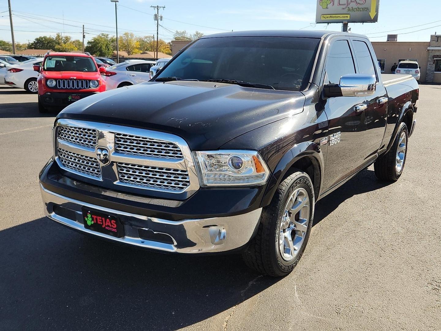 2017 BLACK Ram 1500 Laramie Quad Cab 4x2 6'4" Box (1C6RR6JT9HS) with an HEMI 5.7L V-8 variable valve control, regular unleaded, engine with cylinder deactivation and 395HP engine, located at 4110 Avenue Q, Lubbock, 79412, 33.556553, -101.855820 - 11/04/2025 KEY IN ENVELOPE GOD - Photo#3