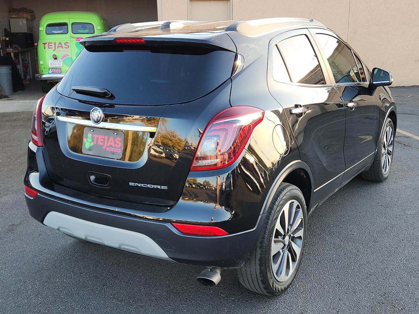 2019 BLACK Buick Encore FWD Essence (KL4CJCSM8KB) with an 1.4L I-4 gasoline direct injection, DOHC, VVT variable valve control, intercooled turbo, regular unleaded, engine with 153HP engine, located at 4110 Avenue Q, Lubbock, 79412, 33.556553, -101.855820 - 11/29/2025 KEY IN ENVELOPE GOD - Photo#1