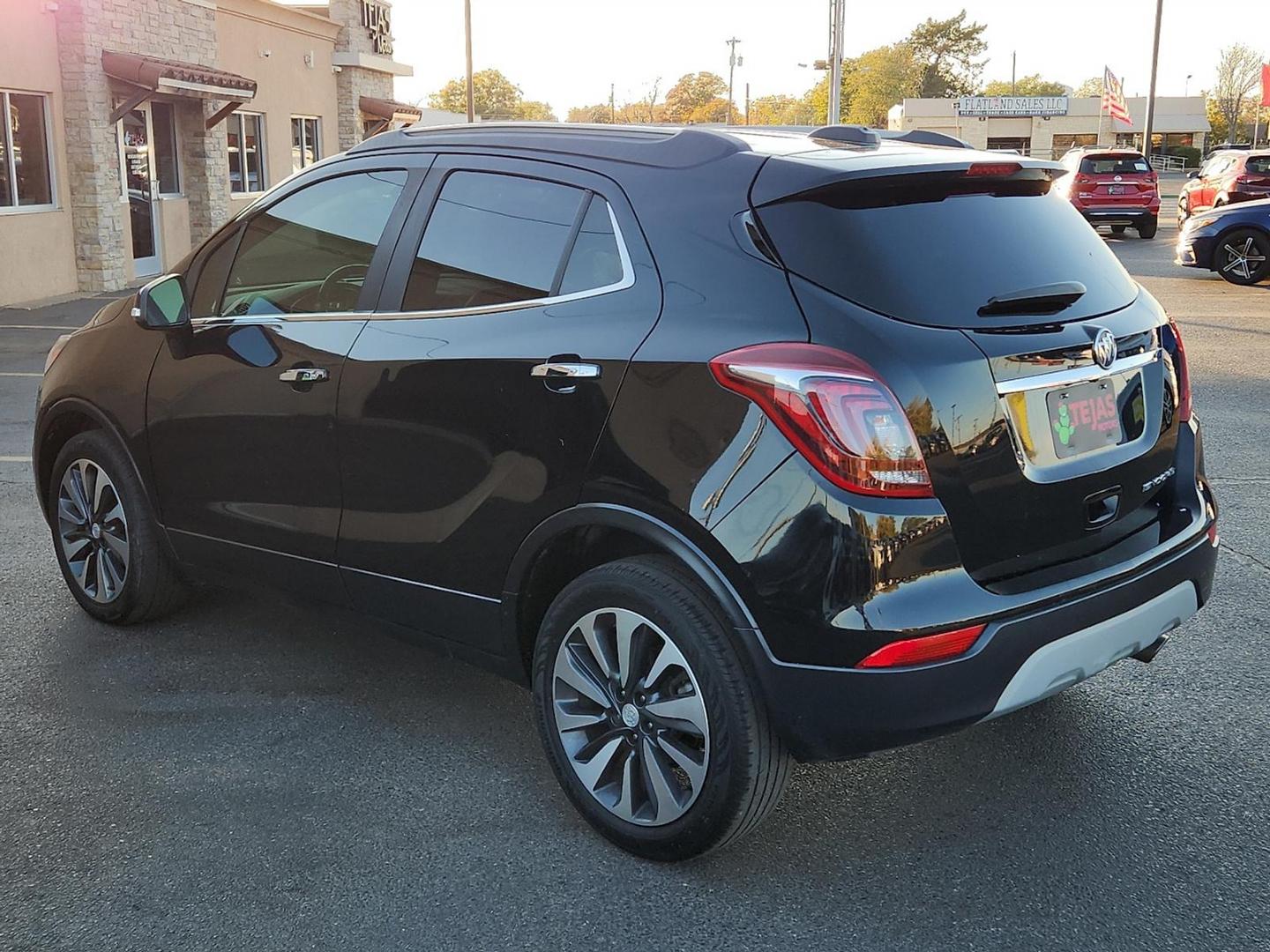 2019 BLACK Buick Encore FWD Essence (KL4CJCSM8KB) with an 1.4L I-4 gasoline direct injection, DOHC, VVT variable valve control, intercooled turbo, regular unleaded, engine with 153HP engine, located at 4110 Avenue Q, Lubbock, 79412, 33.556553, -101.855820 - 11/29/2025 KEY IN ENVELOPE GOD - Photo#2