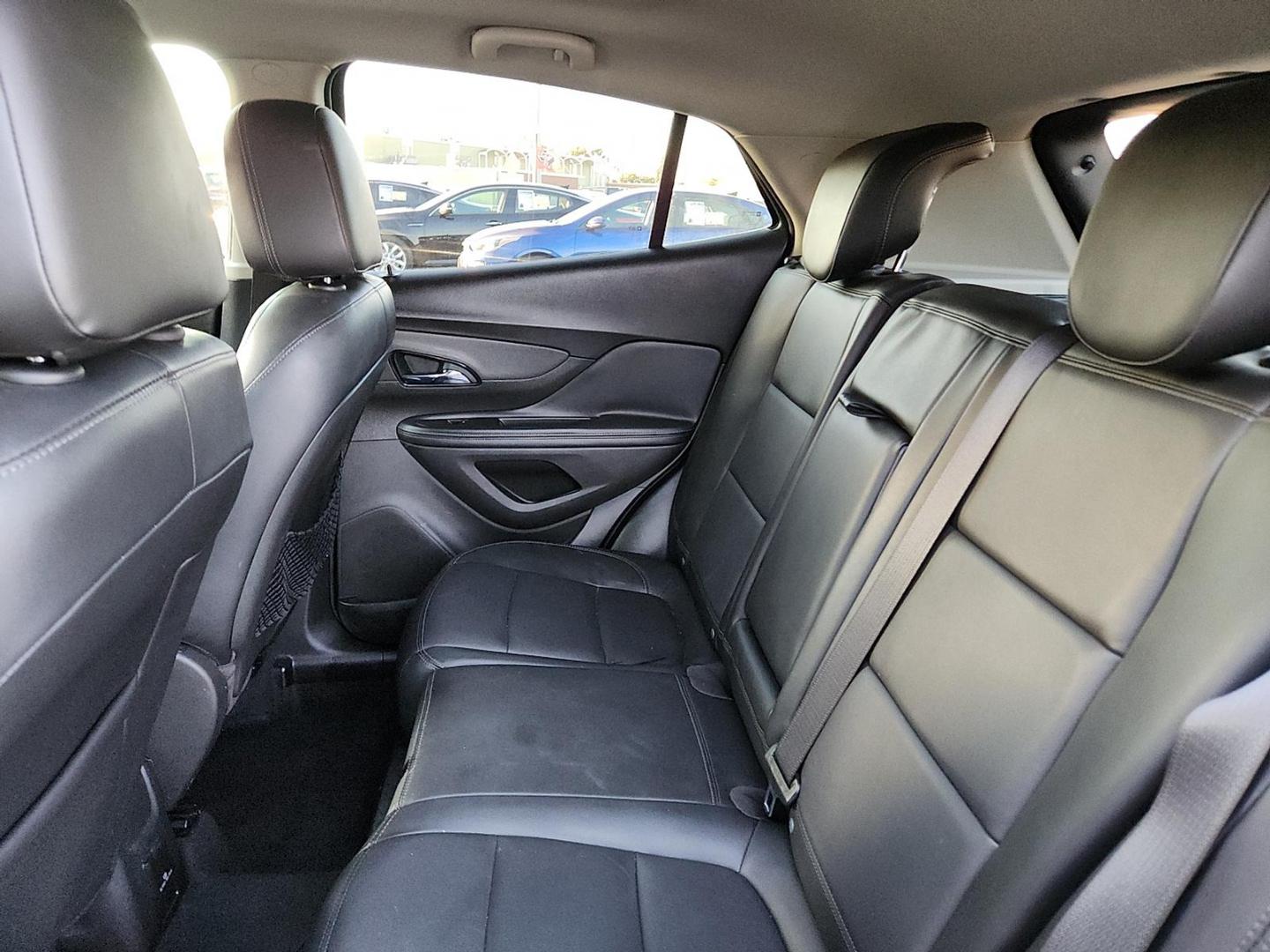 2019 BLACK Buick Encore FWD Essence (KL4CJCSM8KB) with an 1.4L I-4 gasoline direct injection, DOHC, VVT variable valve control, intercooled turbo, regular unleaded, engine with 153HP engine, located at 4110 Avenue Q, Lubbock, 79412, 33.556553, -101.855820 - 11/29/2025 KEY IN ENVELOPE GOD - Photo#4