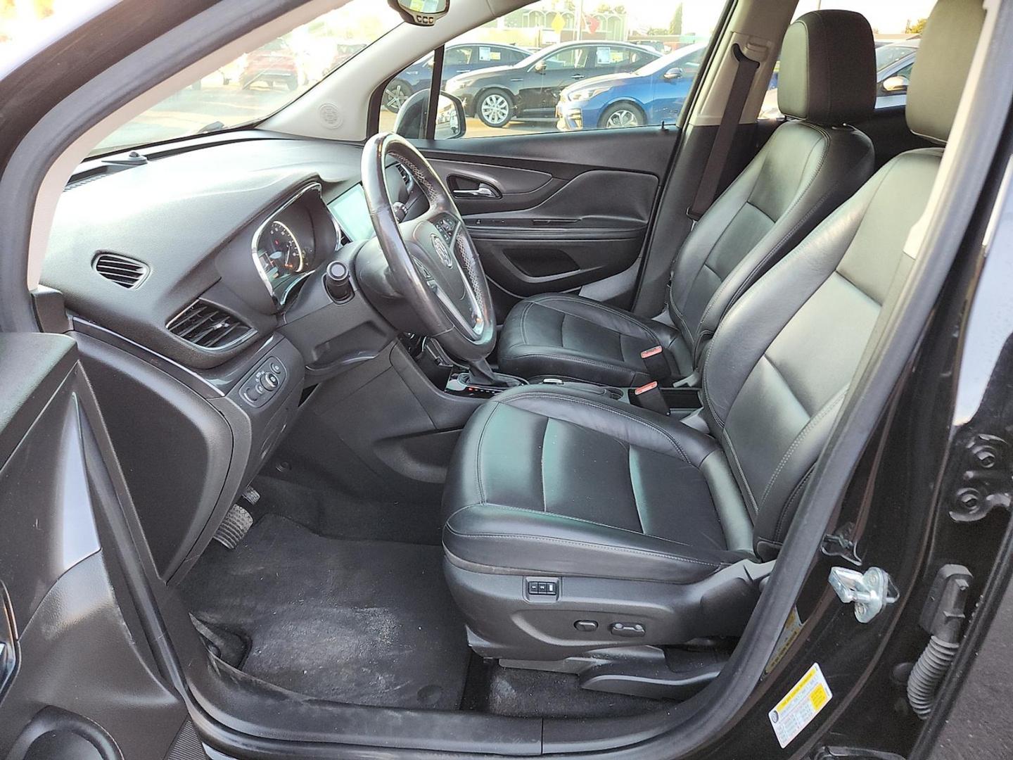 2019 BLACK Buick Encore FWD Essence (KL4CJCSM8KB) with an 1.4L I-4 gasoline direct injection, DOHC, VVT variable valve control, intercooled turbo, regular unleaded, engine with 153HP engine, located at 4110 Avenue Q, Lubbock, 79412, 33.556553, -101.855820 - 11/29/2025 KEY IN ENVELOPE GOD - Photo#6