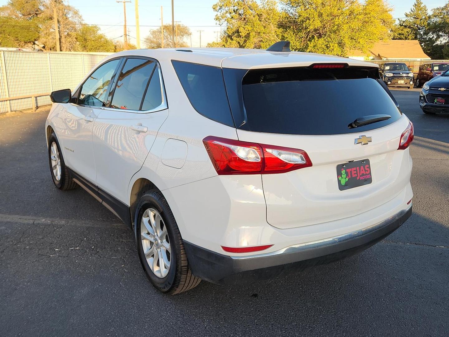 2018 WHITE Chevrolet Equinox LT (2GNAXJEV6J6) with an 1.5L I-4 gasoline direct injection, DOHC, VVT variable valve control, intercooled turbo, regular unleaded, engine with 170HP engine, located at 4110 Avenue Q, Lubbock, 79412, 33.556553, -101.855820 - 11/07/2025 KEY IN ENVELOPE GOD - Photo#2