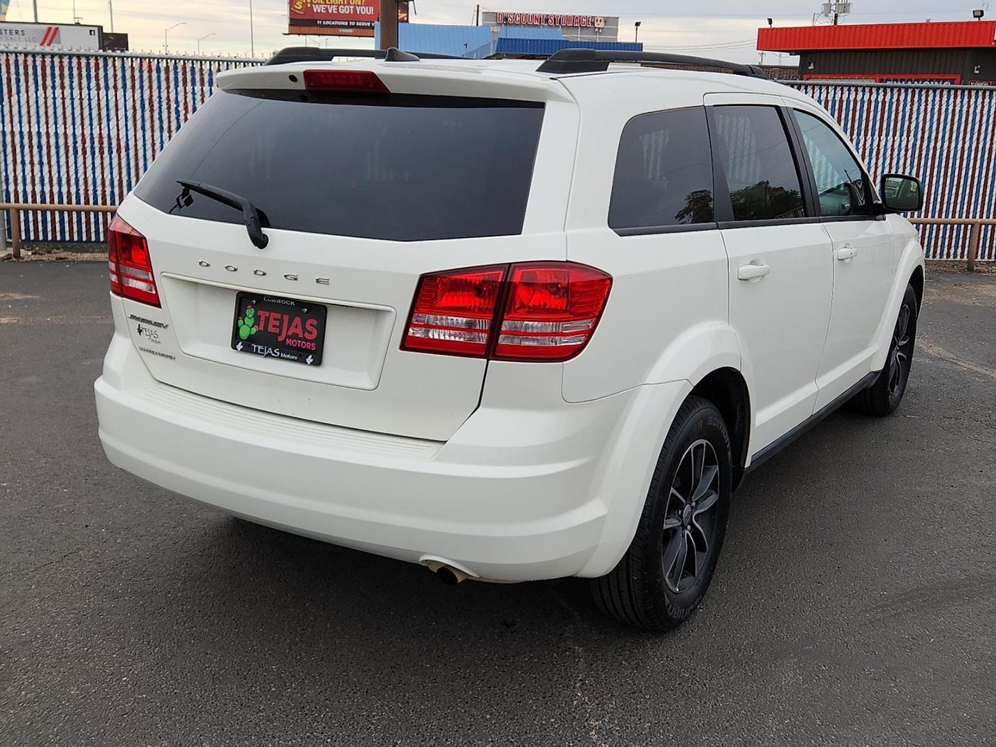 2018 Dodge Journey SE (3C4PDCAB9JT) with an Tigershark MultiAir 2.4L I-4 DOHC, variable valve control, regular unleaded, engine with 173HP engine, located at 4110 Avenue Q, Lubbock, 79412, 33.556553, -101.855820 - 11/19/2025 KEY IN ENVELOPE GOD - Photo#1