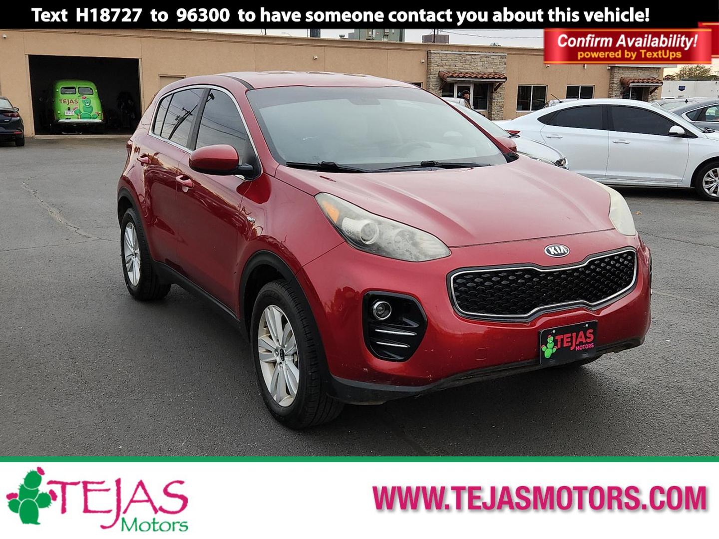 2018 RED Kia Sportage LX (KNDPMCAC0J7) with an Theta II 2.4L I-4 gasoline direct injection, DOHC, D-CVVT variable valve control, regular unleaded, engine with 181HP engine, located at 4110 Avenue Q, Lubbock, 79412, 33.556553, -101.855820 - 11/20/2025 key in envelope god - Photo#0