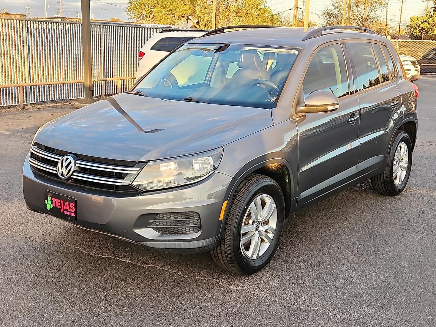 2016 GRAY Volkswagen Tiguan S (WVGAV7AX1GW) with an 2L I-4 gasoline direct injection, DOHC, variable valve control, intercooled turbo, premium unleaded, engine with 200HP engine, located at 4110 Avenue Q, Lubbock, 79412, 33.556553, -101.855820 - Photo#3