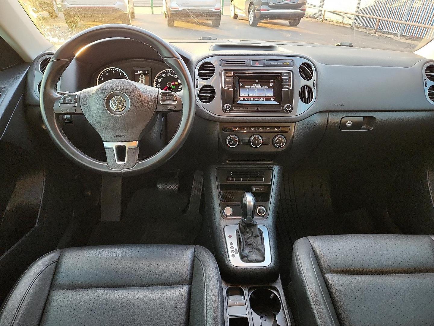 2016 GRAY Volkswagen Tiguan S (WVGAV7AX1GW) with an 2L I-4 gasoline direct injection, DOHC, variable valve control, intercooled turbo, premium unleaded, engine with 200HP engine, located at 4110 Avenue Q, Lubbock, 79412, 33.556553, -101.855820 - Photo#5