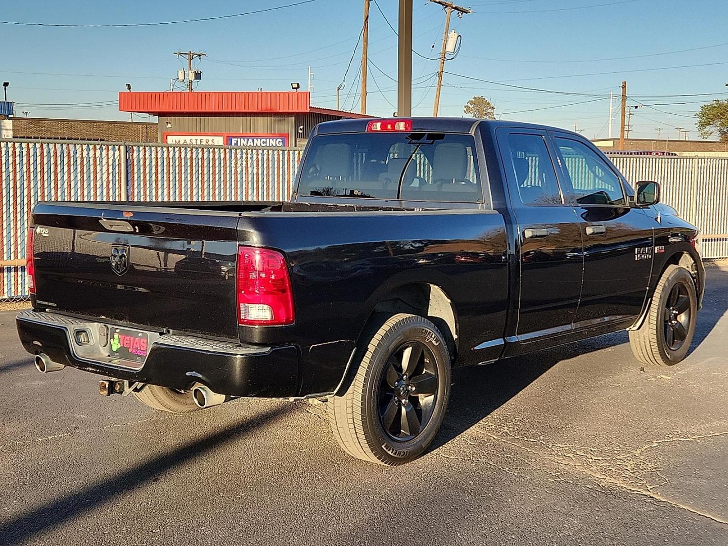2017 BLACK Ram 1500 Express Quad Cab 4x2 6'4" Box (1C6RR6FT7HS) with an HEMI 5.7L V-8 variable valve control, regular unleaded, engine with cylinder deactivation and 395HP engine, located at 4110 Avenue Q, Lubbock, 79412, 33.556553, -101.855820 - Photo#1