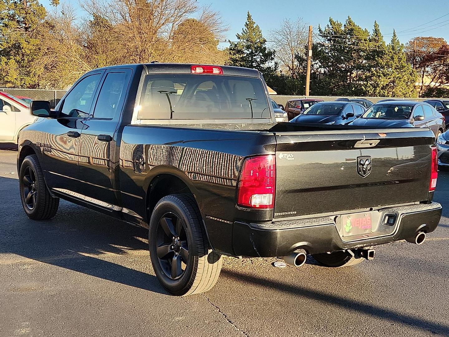 2017 BLACK Ram 1500 Express Quad Cab 4x2 6'4" Box (1C6RR6FT7HS) with an HEMI 5.7L V-8 variable valve control, regular unleaded, engine with cylinder deactivation and 395HP engine, located at 4110 Avenue Q, Lubbock, 79412, 33.556553, -101.855820 - Photo#2