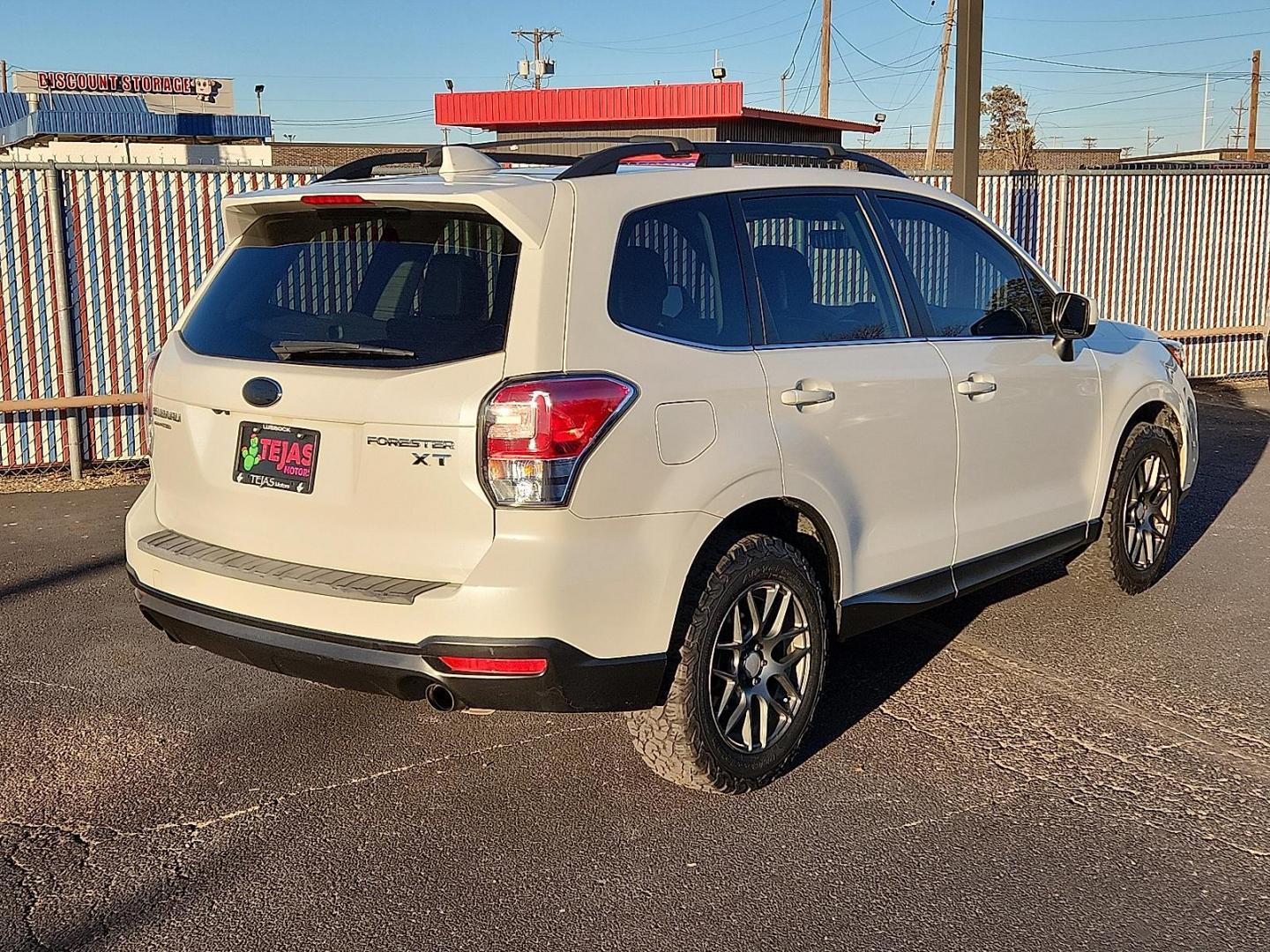 2017 WHITE Subaru Forester 2.0XT Premium (JF2SJGEC6HH) with an 2L H-4 gasoline direct injection, DOHC, variable valve control, intercooled turbo, premium unleaded, engine with 250HP engine, located at 4110 Avenue Q, Lubbock, 79412, 33.556553, -101.855820 - 01/02/2025 WENT TO LSAA AND GAVE CHARLA TITLE TO BE CORRECTED AND SAID SHE WOULD HAVE TO SENT IT BACK TO JACKIE TO GET TITLE TO FIXED ON MILEAGE GOD - Photo#1
