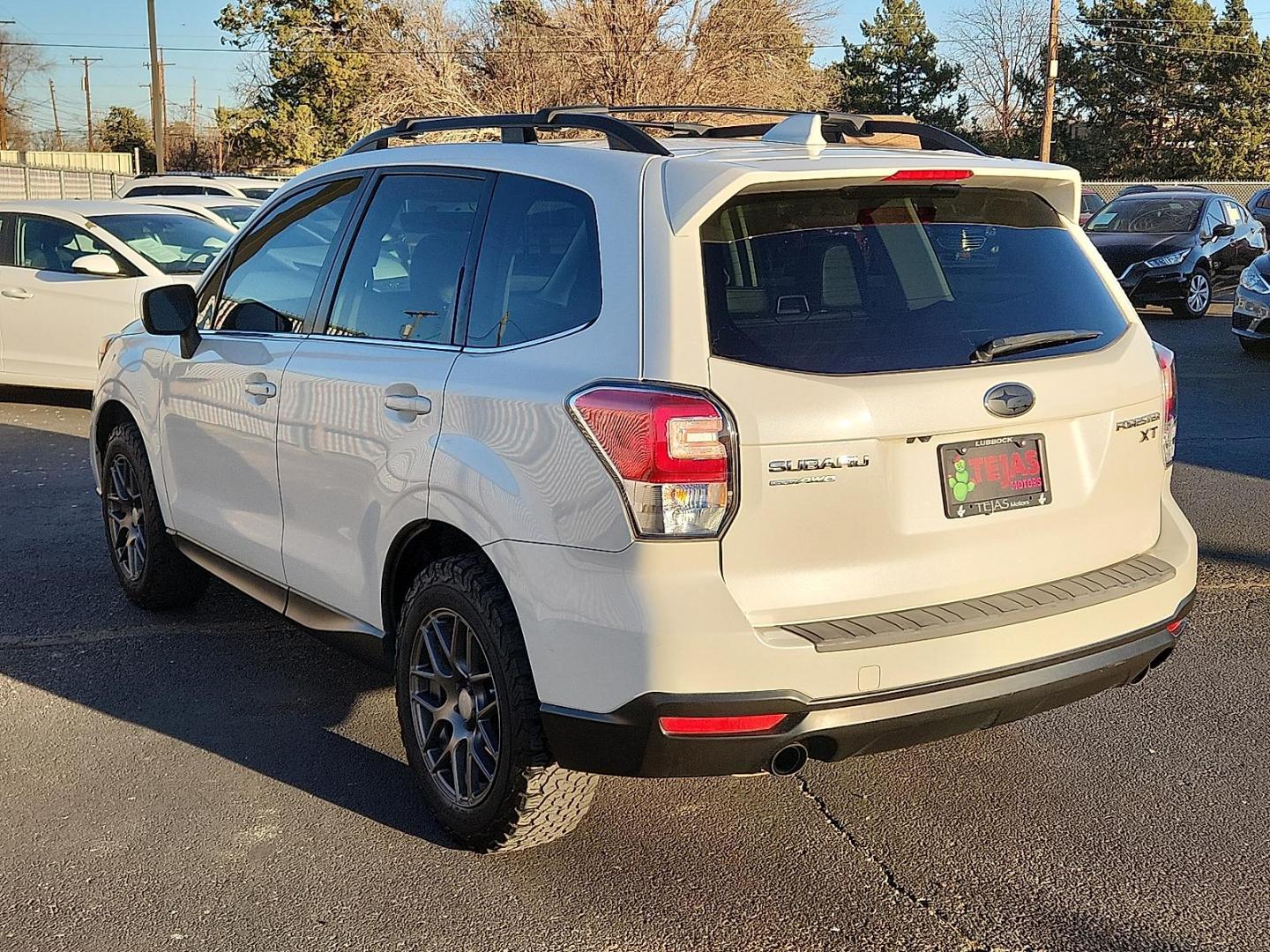 2017 WHITE Subaru Forester 2.0XT Premium (JF2SJGEC6HH) with an 2L H-4 gasoline direct injection, DOHC, variable valve control, intercooled turbo, premium unleaded, engine with 250HP engine, located at 4110 Avenue Q, Lubbock, 79412, 33.556553, -101.855820 - 01/02/2025 WENT TO LSAA AND GAVE CHARLA TITLE TO BE CORRECTED AND SAID SHE WOULD HAVE TO SENT IT BACK TO JACKIE TO GET TITLE TO FIXED ON MILEAGE GOD - Photo#2