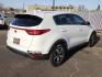 2020 WHITE Kia Sportage LX (KNDPM3AC5L7) with an Theta II 2.4L I-4 gasoline direct injection, DOHC, D-CVVT variable valve control, regular unleaded, engine with 181HP engine, located at 4110 Avenue Q, Lubbock, 79412, 33.556553, -101.855820 - 12/26/2025 KEY IN ENVELOPE GOD - Photo#1