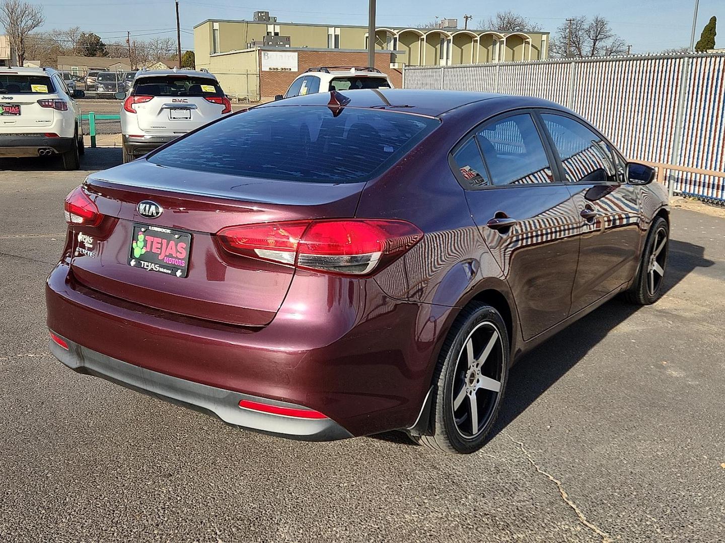 2017 RED Kia Forte LX (3KPFK4A77HE) with an 2L I-4 DOHC, D-CVVT variable valve control, regular unleaded, engine with 147HP engine, located at 4110 Avenue Q, Lubbock, 79412, 33.556553, -101.855820 - 12/26/2025 KEY IN ENVELOPE GOD - Photo#1