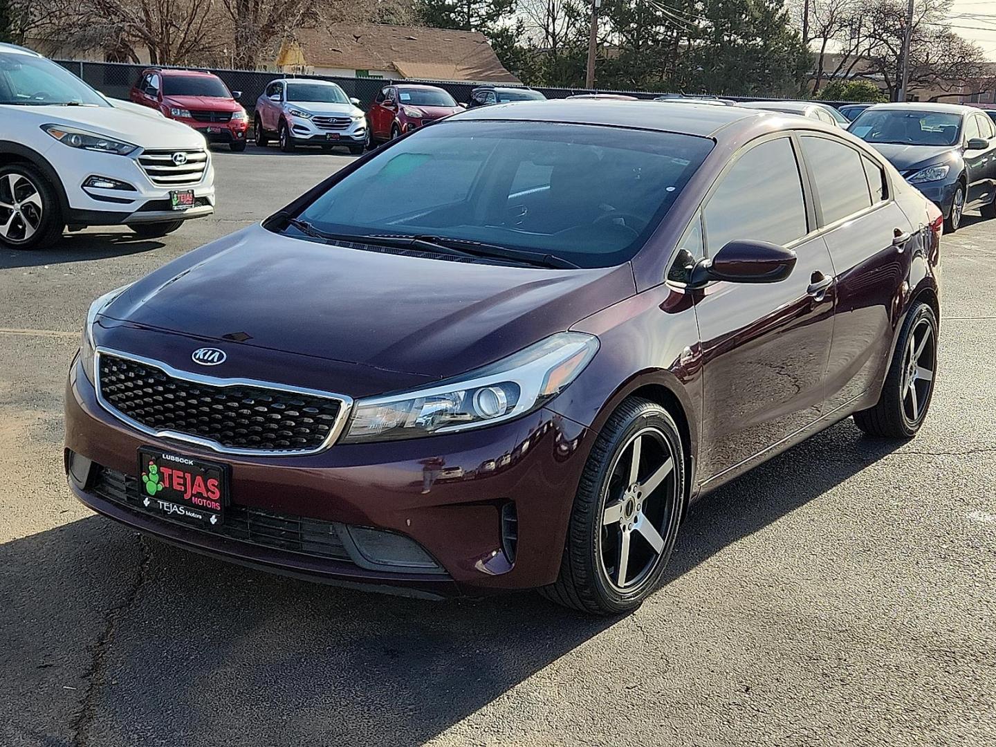 2017 RED Kia Forte LX (3KPFK4A77HE) with an 2L I-4 DOHC, D-CVVT variable valve control, regular unleaded, engine with 147HP engine, located at 4110 Avenue Q, Lubbock, 79412, 33.556553, -101.855820 - 12/26/2025 KEY IN ENVELOPE GOD - Photo#3