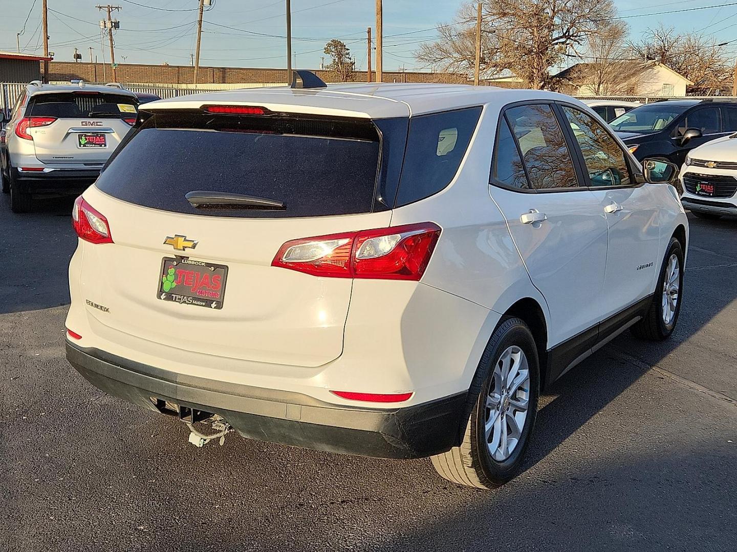 2021 WHITE Chevrolet Equinox FWD LS (3GNAXHEV0MS) with an 1.5L I-4 gasoline direct injection, DOHC, VVT variable valve control, intercooled turbo, regular unleaded, engine with 170HP engine, located at 4110 Avenue Q, Lubbock, 79412, 33.556553, -101.855820 - Photo#1