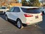 2021 WHITE Chevrolet Equinox FWD LS (3GNAXHEV0MS) with an 1.5L I-4 gasoline direct injection, DOHC, VVT variable valve control, intercooled turbo, regular unleaded, engine with 170HP engine, located at 4110 Avenue Q, Lubbock, 79412, 33.556553, -101.855820 - Photo#2