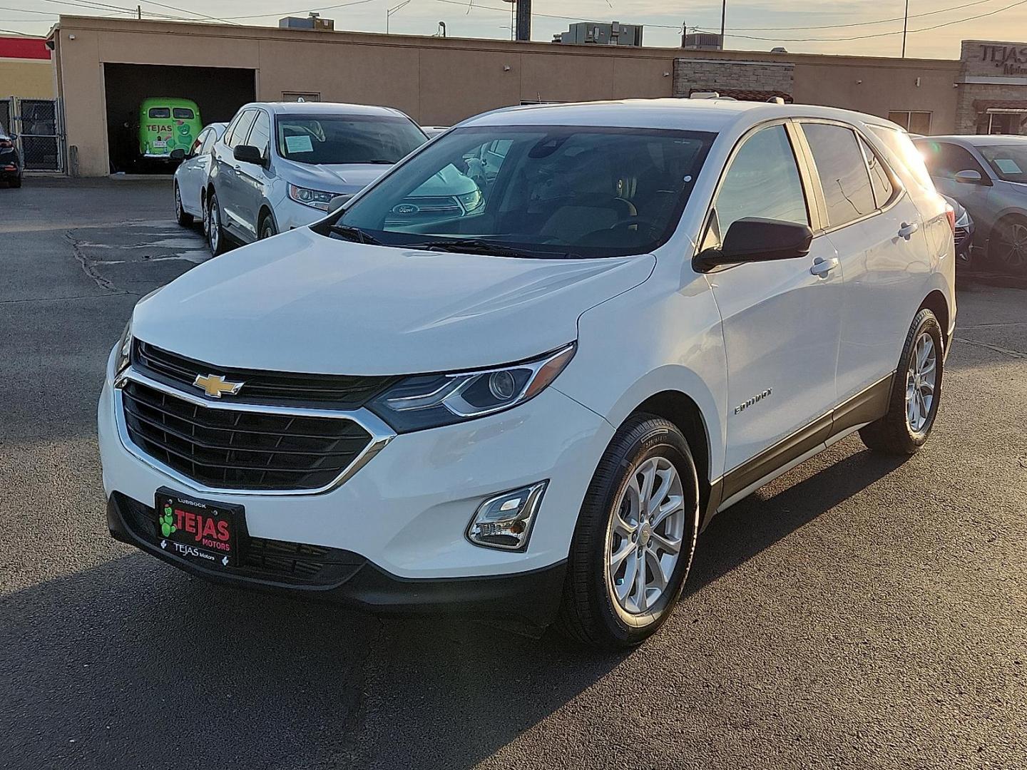 2021 WHITE Chevrolet Equinox FWD LS (3GNAXHEV0MS) with an 1.5L I-4 gasoline direct injection, DOHC, VVT variable valve control, intercooled turbo, regular unleaded, engine with 170HP engine, located at 4110 Avenue Q, Lubbock, 79412, 33.556553, -101.855820 - Photo#3