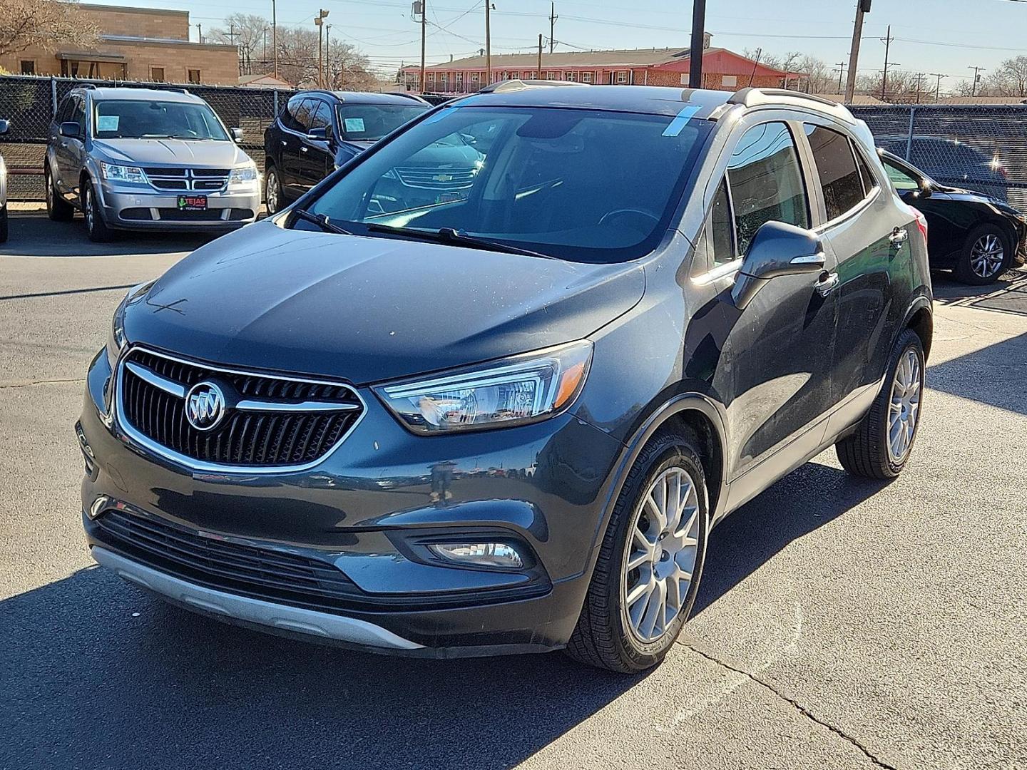 2018 Graphite Gray Metallic Buick Encore Sport Touring (KL4CJ1SB8JB) with an ECOTEC 1.4L I-4 DOHC, VVT variable valve control, intercooled turbo, regular unleaded, engine with 138HP engine, located at 4110 Avenue Q, Lubbock, 79412, 33.556553, -101.855820 - Photo#3
