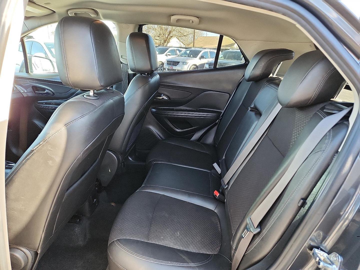 2018 Graphite Gray Metallic Buick Encore Sport Touring (KL4CJ1SB8JB) with an ECOTEC 1.4L I-4 DOHC, VVT variable valve control, intercooled turbo, regular unleaded, engine with 138HP engine, located at 4110 Avenue Q, Lubbock, 79412, 33.556553, -101.855820 - Photo#4