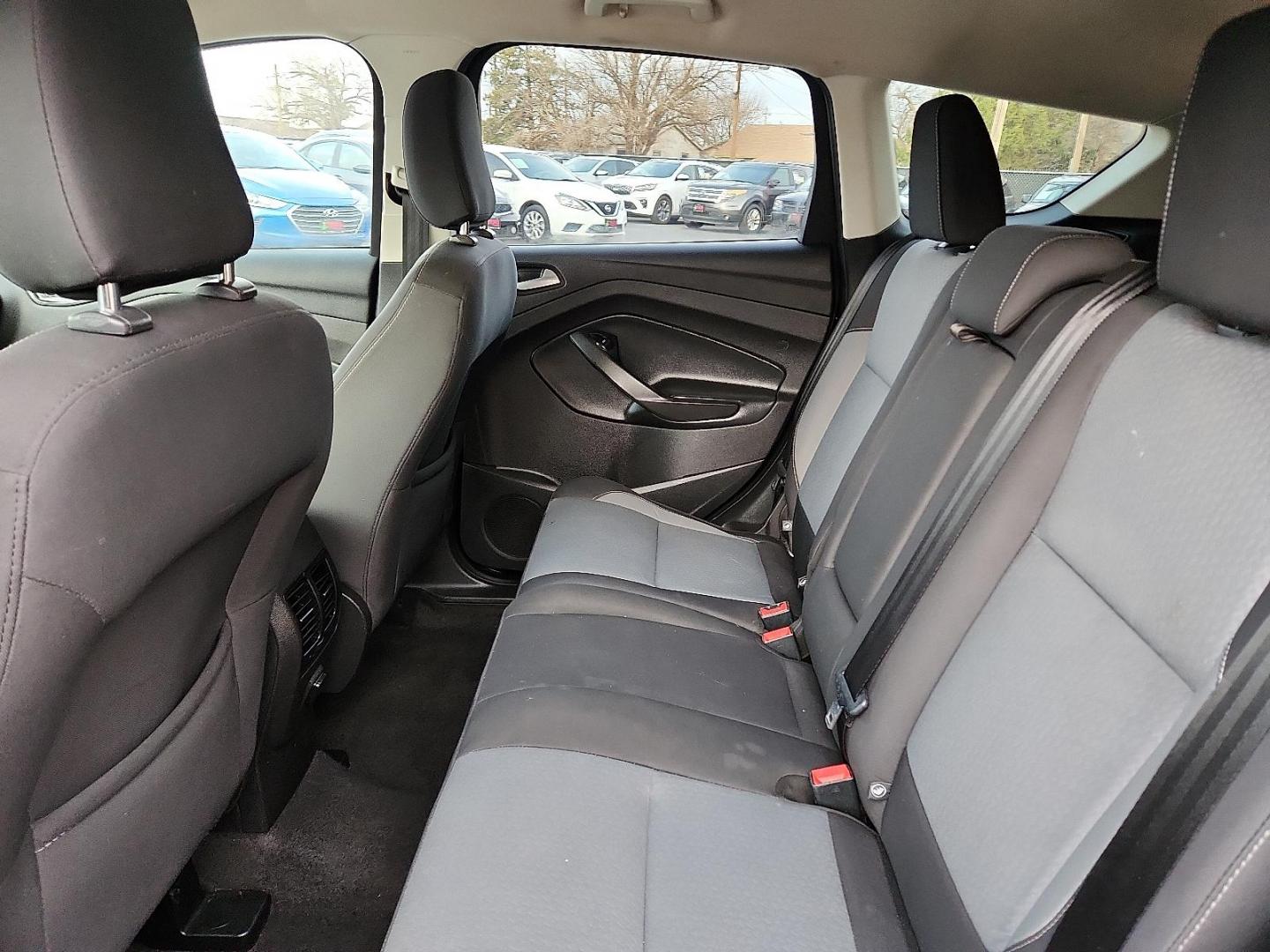 2018 BLACK Ford Escape SE (1FMCU0GD5JU) with an EcoBoost 1.5L I-4 gasoline direct injection, DOHC, variable valve control, intercooled turbo, regular unleaded, engine with 179HP engine, located at 4110 Avenue Q, Lubbock, 79412, 33.556553, -101.855820 - 01/15/2026 KEY IN ENVELOPE GOD - Photo#4