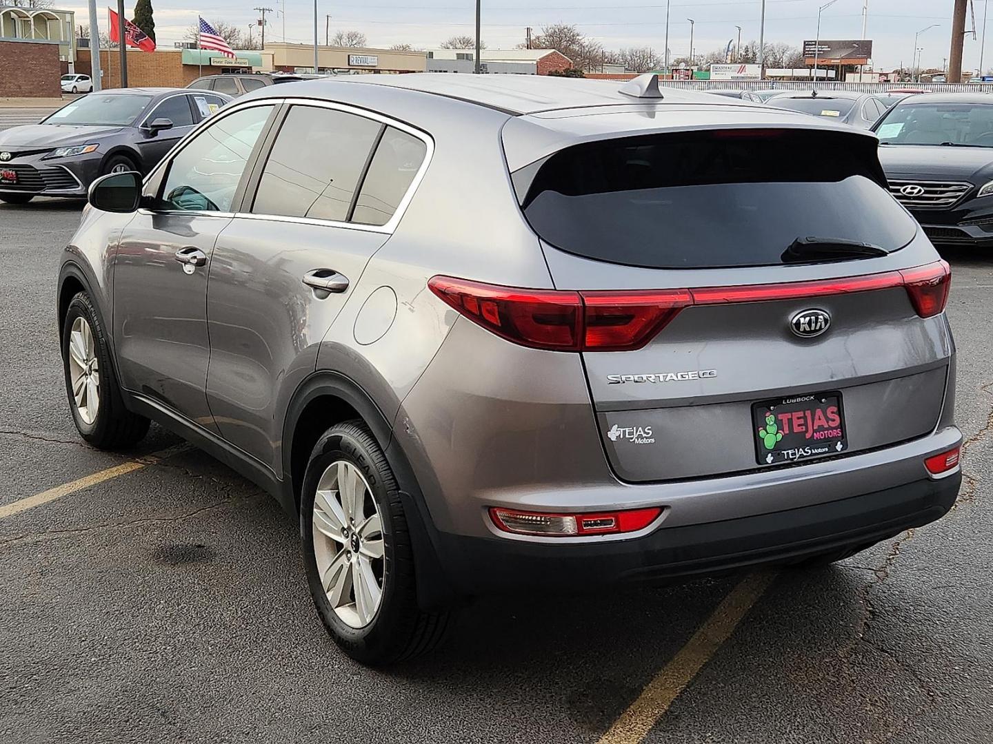 2017 SILVER Kia Sportage LX (KNDPM3AC3H7) with an Theta II 2.4L I-4 gasoline direct injection, DOHC, D-CVVT variable valve control, regular unleaded, engine with 181HP engine, located at 4110 Avenue Q, Lubbock, 79412, 33.556553, -101.855820 - 01/17/2026 KEY IN ENVELOPE GOD - Photo#2