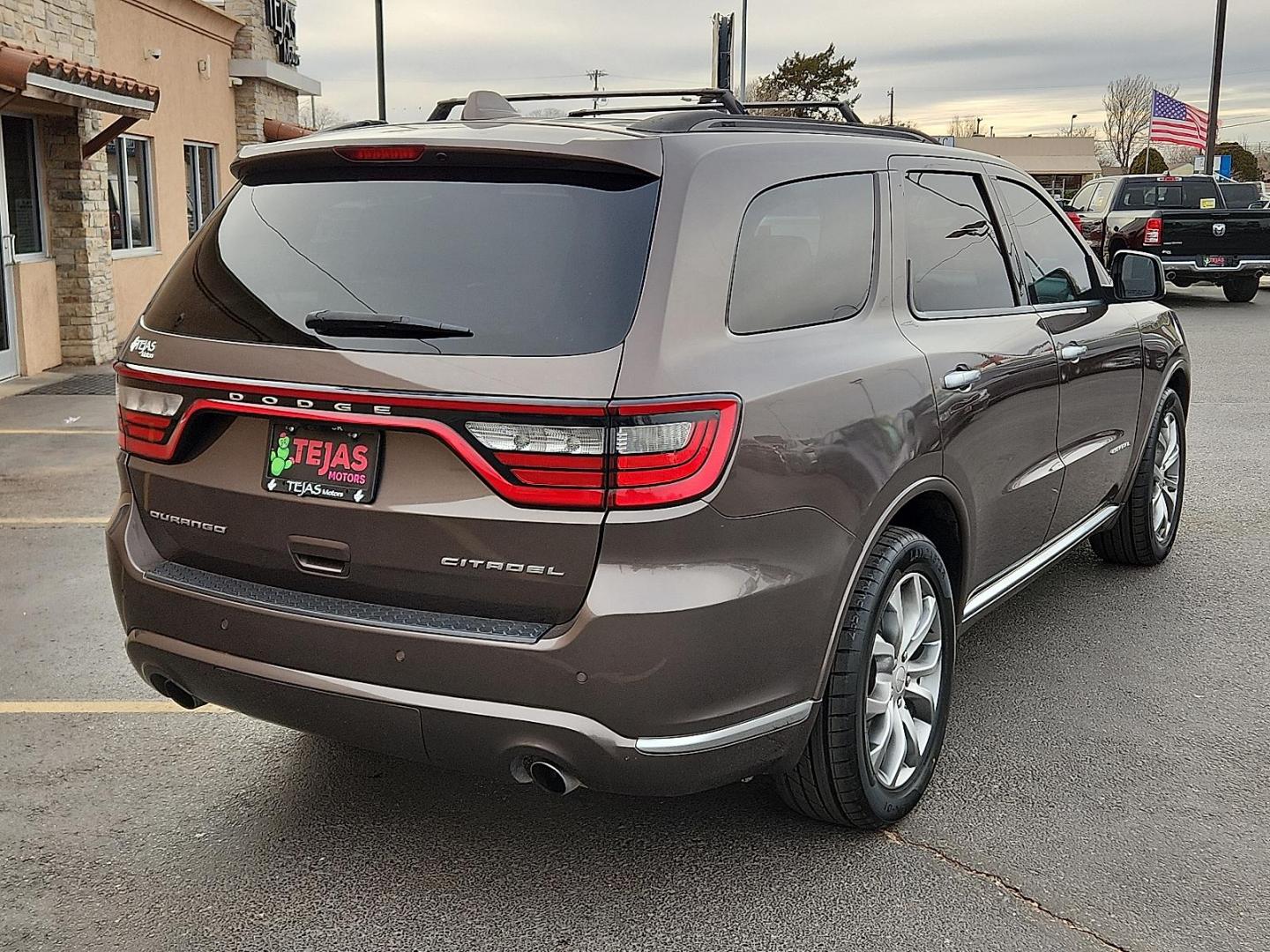 2017 BROWN Dodge Durango Citadel Anodized Platinum RWD (1C4SDHET6HC) with an HEMI 5.7L V-8 variable valve control, regular unleaded, engine with cylinder deactivation and 360HP engine, located at 4110 Avenue Q, Lubbock, 79412, 33.556553, -101.855820 - 01/20/2026 KEY IN ENVELOPE GOD - Photo#1