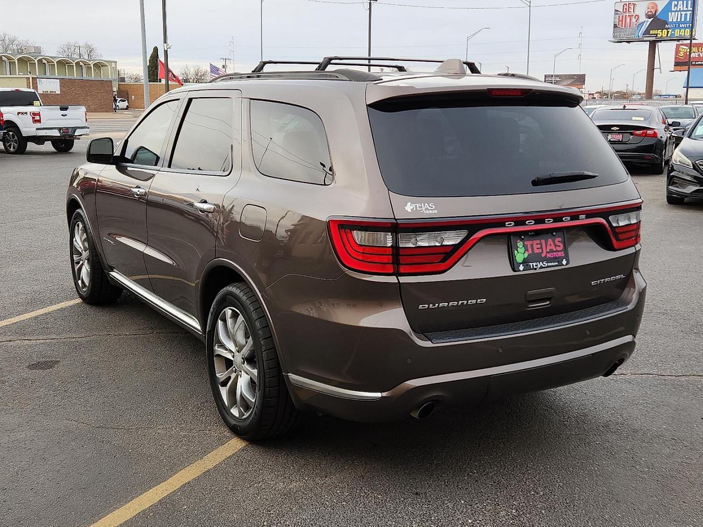 2017 BROWN Dodge Durango Citadel Anodized Platinum RWD (1C4SDHET6HC) with an HEMI 5.7L V-8 variable valve control, regular unleaded, engine with cylinder deactivation and 360HP engine, located at 4110 Avenue Q, Lubbock, 79412, 33.556553, -101.855820 - 01/20/2026 KEY IN ENVELOPE GOD - Photo#2
