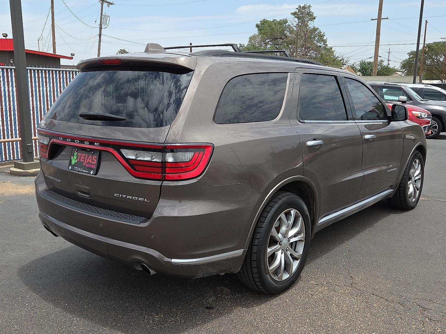 2017 Bomber Brown Pearlcoat - PTW /Black - X9 Dodge Durango Citadel Anodized Platinum RWD (1C4SDHET6HC) with an HEMI 5.7L V-8 variable valve control, regular unleaded, engine with cylinder deactivation and 360HP engine, located at 4110 Avenue Q, Lubbock, 79412, 33.556553, -101.855820- Photo#2