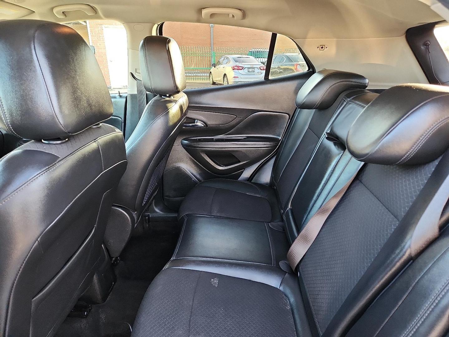 2019 WHITE Buick Encore AWD Preferred (KL4CJESBXKB) with an Ecotec 1.4L I-4 DOHC, variable valve control, intercooled turbo, regular unleaded, engine with 138HP engine, located at 4110 Avenue Q, Lubbock, 79412, 33.556553, -101.855820 - 01/23/2026 KEY IN ENVELOPE GOD - Photo#4