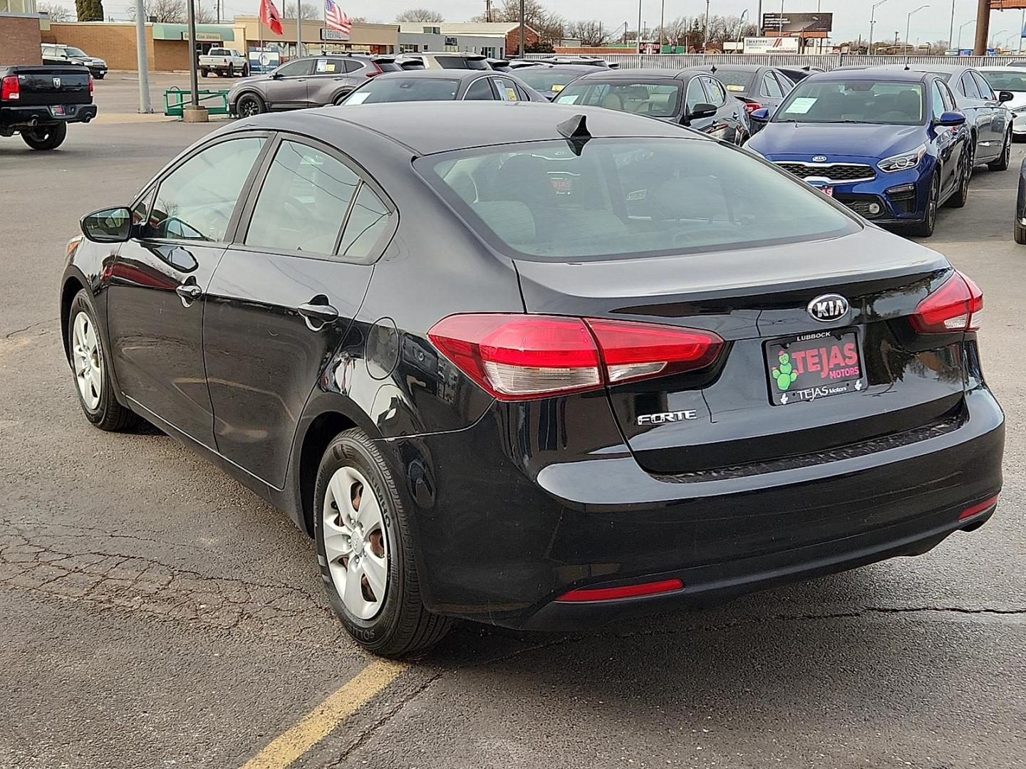 2018 BLACK Kia Forte LX (3KPFK4A78JE) with an 2L I-4 DOHC, D-CVVT variable valve control, regular unleaded, engine with 147HP engine, located at 4110 Avenue Q, Lubbock, 79412, 33.556553, -101.855820 - 01/29/2026 KEY IN ENVELOPE GOD - Photo#2