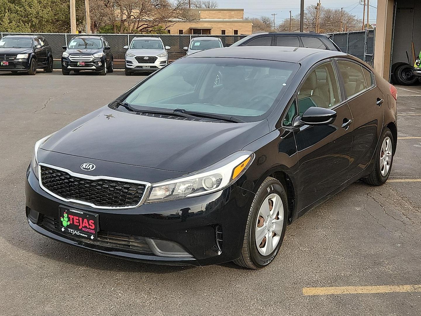 2018 BLACK Kia Forte LX (3KPFK4A78JE) with an 2L I-4 DOHC, D-CVVT variable valve control, regular unleaded, engine with 147HP engine, located at 4110 Avenue Q, Lubbock, 79412, 33.556553, -101.855820 - 01/29/2026 KEY IN ENVELOPE GOD - Photo#3