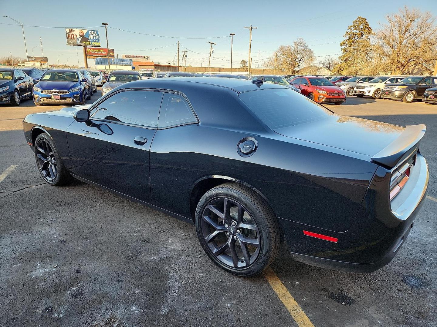 2021 BLACK Dodge Challenger SXT (2C3CDZAG3MH) with an Pentastar 3.6L V-6 DOHC, variable valve control, regular unleaded, engine with 303HP engine, located at 4110 Avenue Q, Lubbock, 79412, 33.556553, -101.855820 - Photo#2