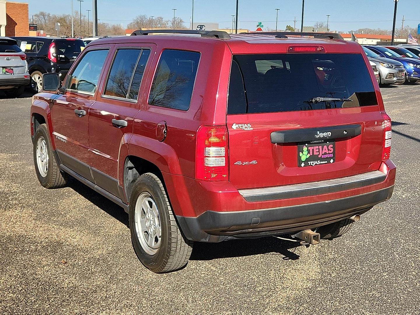 2016 RED Jeep Patriot Sport (1C4NJRBB0GD) with an 2.4L I-4 DOHC, variable valve control, regular unleaded, engine with 172HP engine, located at 4110 Avenue Q, Lubbock, 79412, 33.556553, -101.855820 - 02/11/2026 KEY IN ENVELOPE GOD - Photo#3