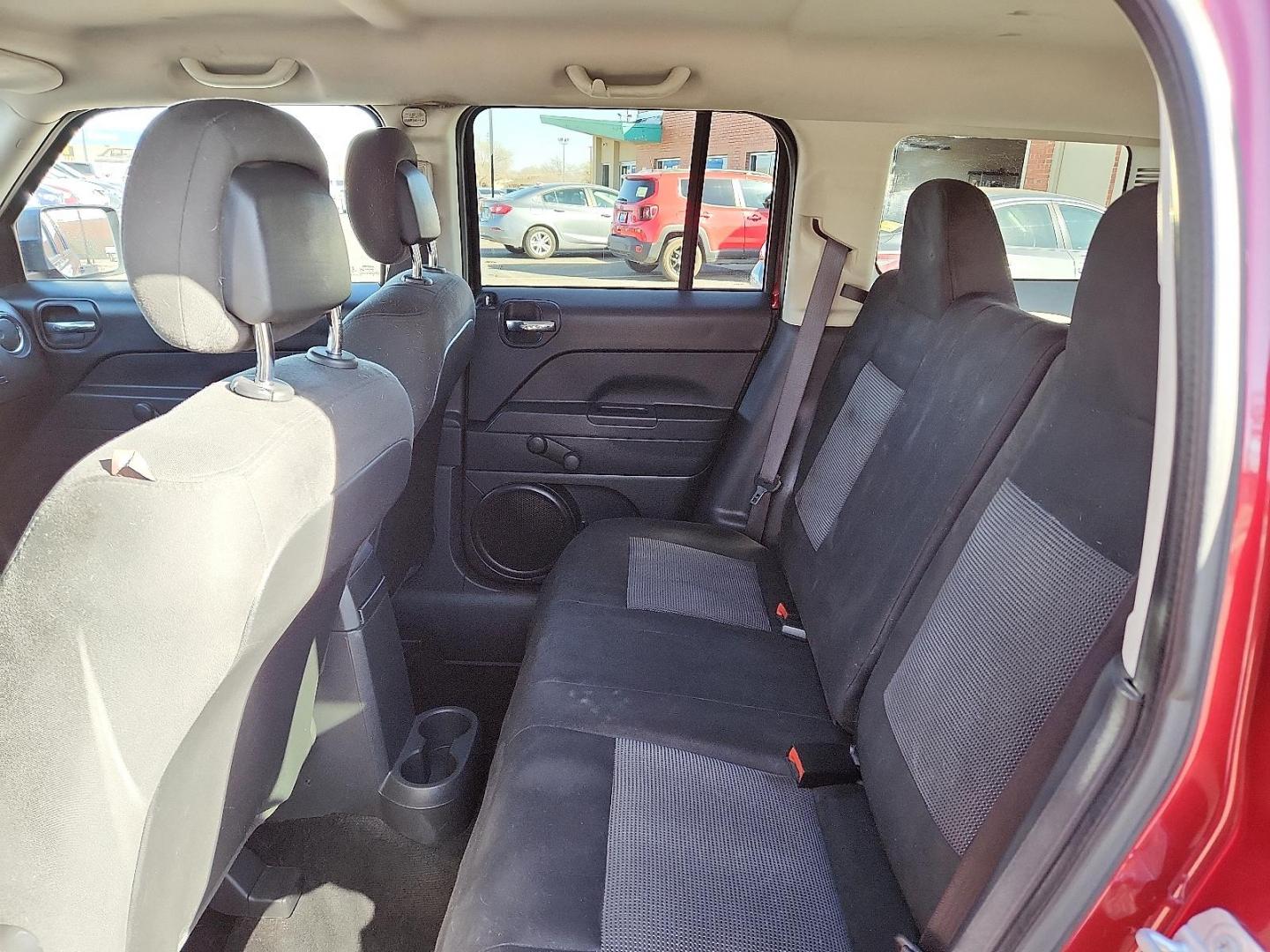 2016 RED Jeep Patriot Sport (1C4NJRBB0GD) with an 2.4L I-4 DOHC, variable valve control, regular unleaded, engine with 172HP engine, located at 4110 Avenue Q, Lubbock, 79412, 33.556553, -101.855820 - 02/11/2026 KEY IN ENVELOPE GOD - Photo#4