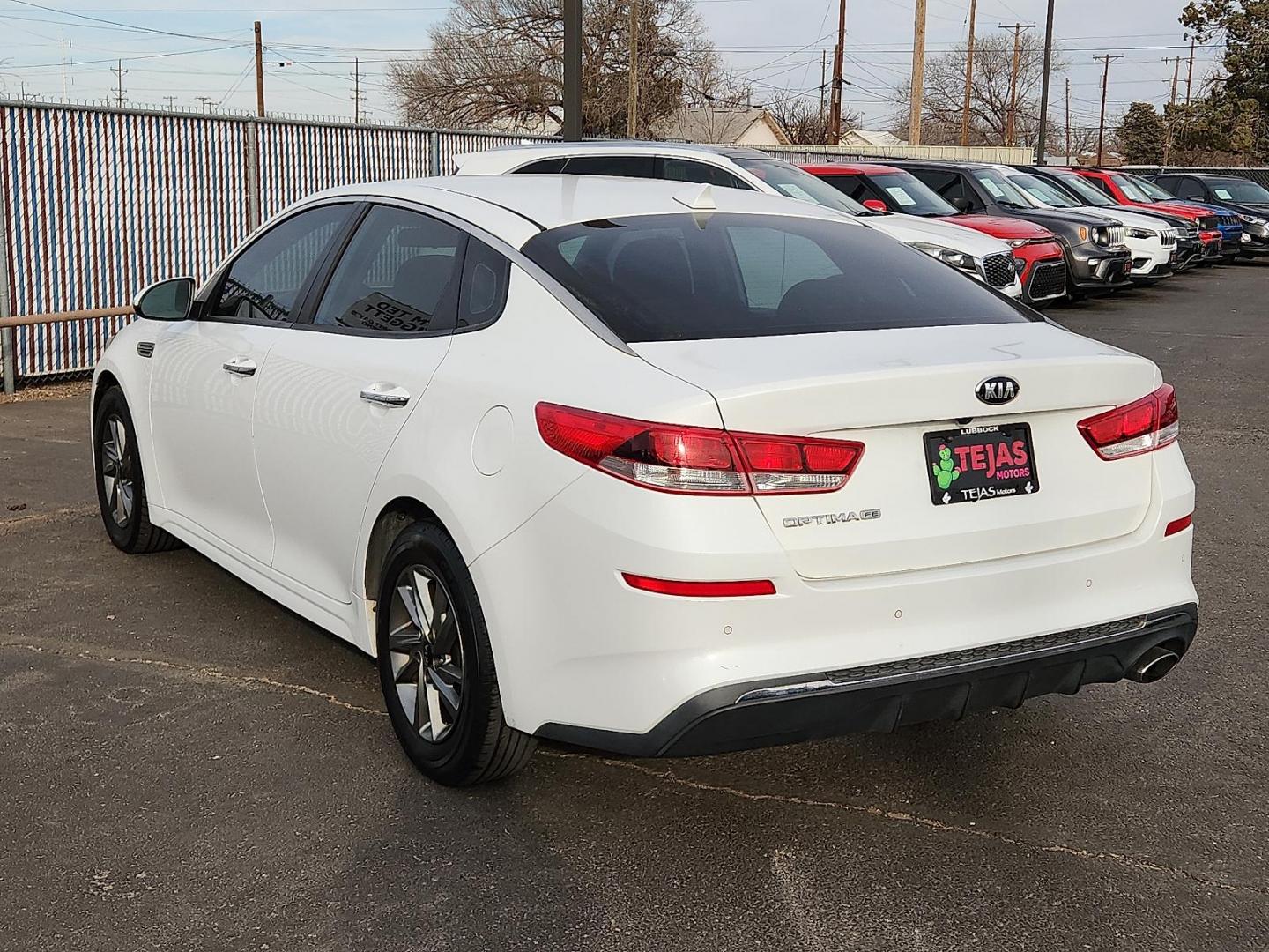 2019 WHITE Kia Optima LX (5XXGT4L32KG) with an Theta II 2.4L I-4 gasoline direct injection, DOHC, D-CVVT variable valve control, regular unleaded, engine with 185HP engine, located at 4110 Avenue Q, Lubbock, 79412, 33.556553, -101.855820 - 02/10/2026 KEY IN ENVELOPE GOD - Photo#2