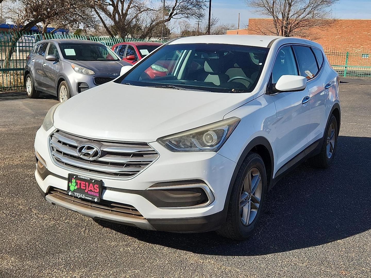 2018 WHITE Hyundai Santa Fe Sport 2.4L (5NMZT3LB6JH) with an Theta II 2.4L I-4 gasoline direct injection, DOHC, D-CVVT variable valve control, regular unleaded, engine with 185HP engine, located at 4110 Avenue Q, Lubbock, 79412, 33.556553, -101.855820 - 02/14/2026 KEY IN ENVELOPE GOD - Photo#1