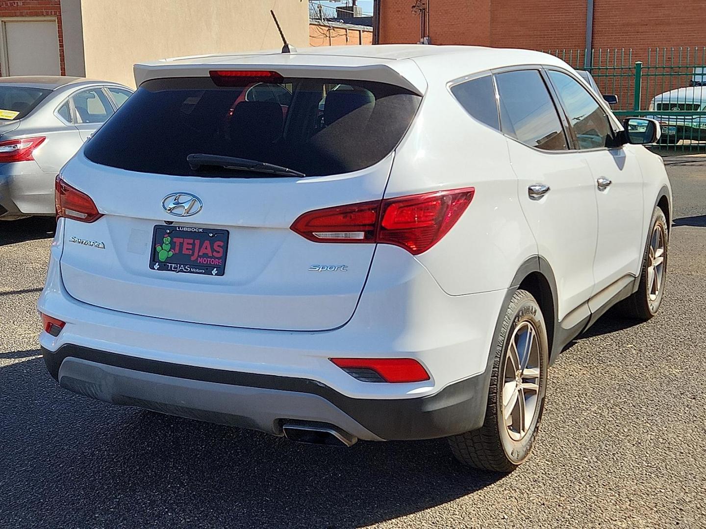 2018 WHITE Hyundai Santa Fe Sport 2.4L (5NMZT3LB6JH) with an Theta II 2.4L I-4 gasoline direct injection, DOHC, D-CVVT variable valve control, regular unleaded, engine with 185HP engine, located at 4110 Avenue Q, Lubbock, 79412, 33.556553, -101.855820 - 02/14/2026 KEY IN ENVELOPE GOD - Photo#2