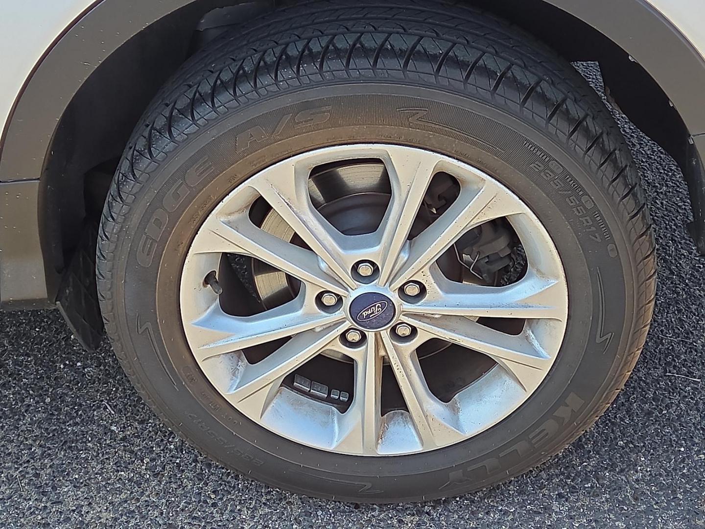 2017 Ingot Silver Metallic - UX /Charcoal Black - KB Ford Escape SE (1FMCU0GDXHU) with an EcoBoost 1.5L I-4 gasoline direct injection, DOHC, variable valve control, intercooled turbo, regular unleaded, engine with 179HP engine, located at 4110 Avenue Q, Lubbock, 79412, 33.556553, -101.855820 - Photo#5