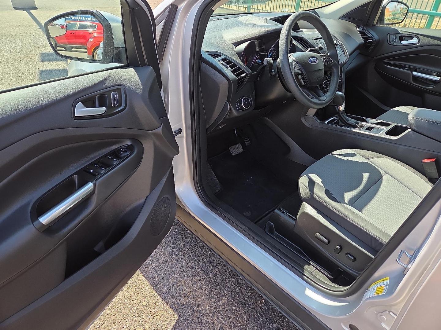 2017 Ingot Silver Metallic - UX /Charcoal Black - KB Ford Escape SE (1FMCU0GDXHU) with an EcoBoost 1.5L I-4 gasoline direct injection, DOHC, variable valve control, intercooled turbo, regular unleaded, engine with 179HP engine, located at 4110 Avenue Q, Lubbock, 79412, 33.556553, -101.855820 - Photo#9