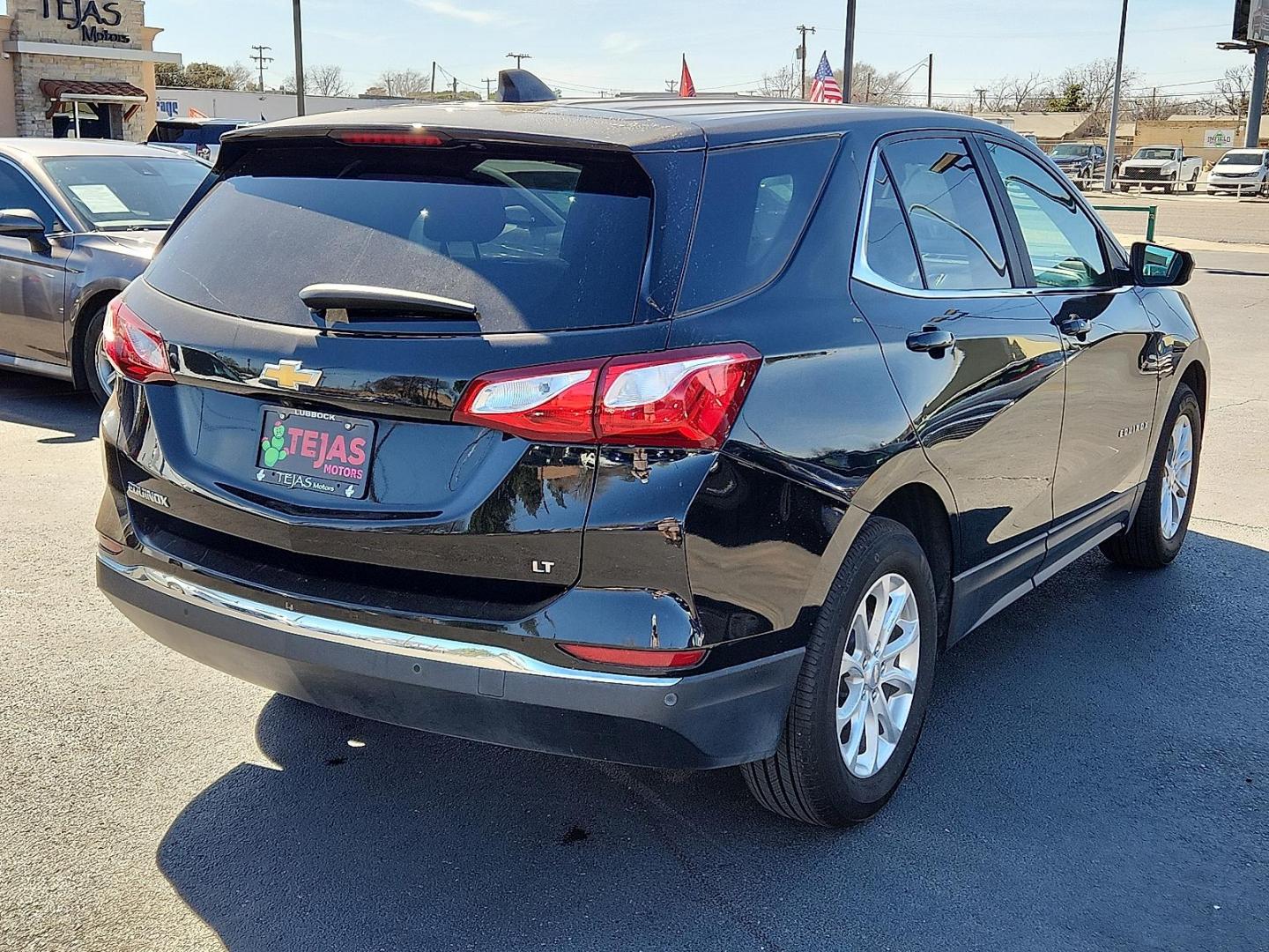 2021 BLACK Chevrolet Equinox FWD 2FL (3GNAXJEV3ML) with an 1.5L I-4 gasoline direct injection, DOHC, VVT variable valve control, intercooled turbo, regular unleaded, engine with 170HP engine, located at 4110 Avenue Q, Lubbock, 79412, 33.556553, -101.855820 - Photo#1