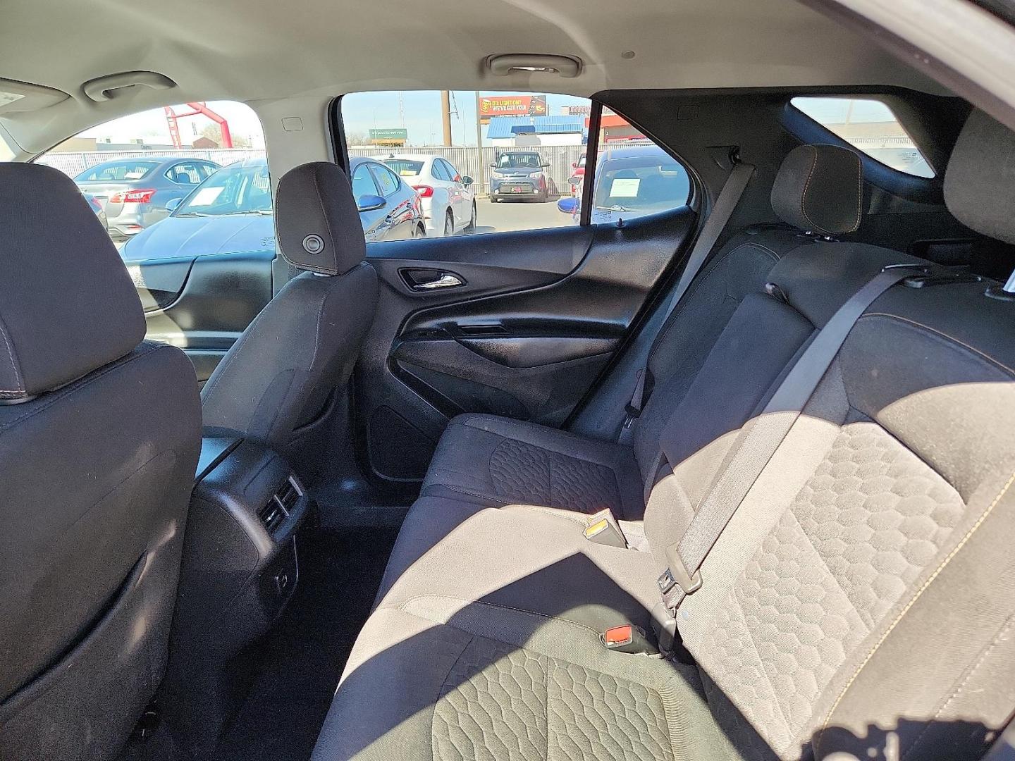 2021 BLACK Chevrolet Equinox FWD 2FL (3GNAXJEV3ML) with an 1.5L I-4 gasoline direct injection, DOHC, VVT variable valve control, intercooled turbo, regular unleaded, engine with 170HP engine, located at 4110 Avenue Q, Lubbock, 79412, 33.556553, -101.855820 - Photo#4