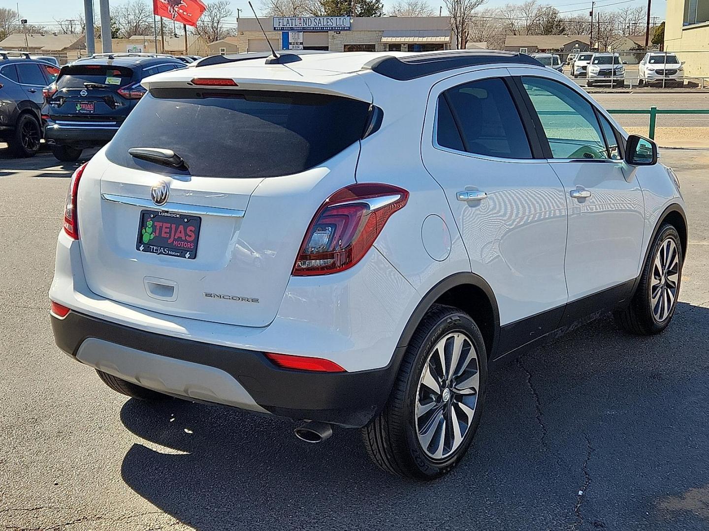 2020 WHITE Buick Encore FWD Essence (KL4CJCSB1LB) with an ECOTEC 1.4L I-4 DOHC, variable valve control, intercooled turbo, regular unleaded, engine with 138HP engine, located at 4110 Avenue Q, Lubbock, 79412, 33.556553, -101.855820 - 02/24/2026 KEY IN ENVELOPE GOD - Photo#1