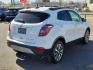 2020 WHITE Buick Encore FWD Essence (KL4CJCSB1LB) with an ECOTEC 1.4L I-4 DOHC, variable valve control, intercooled turbo, regular unleaded, engine with 138HP engine, located at 4110 Avenue Q, Lubbock, 79412, 33.556553, -101.855820 - 02/24/2026 KEY IN ENVELOPE GOD - Photo#1