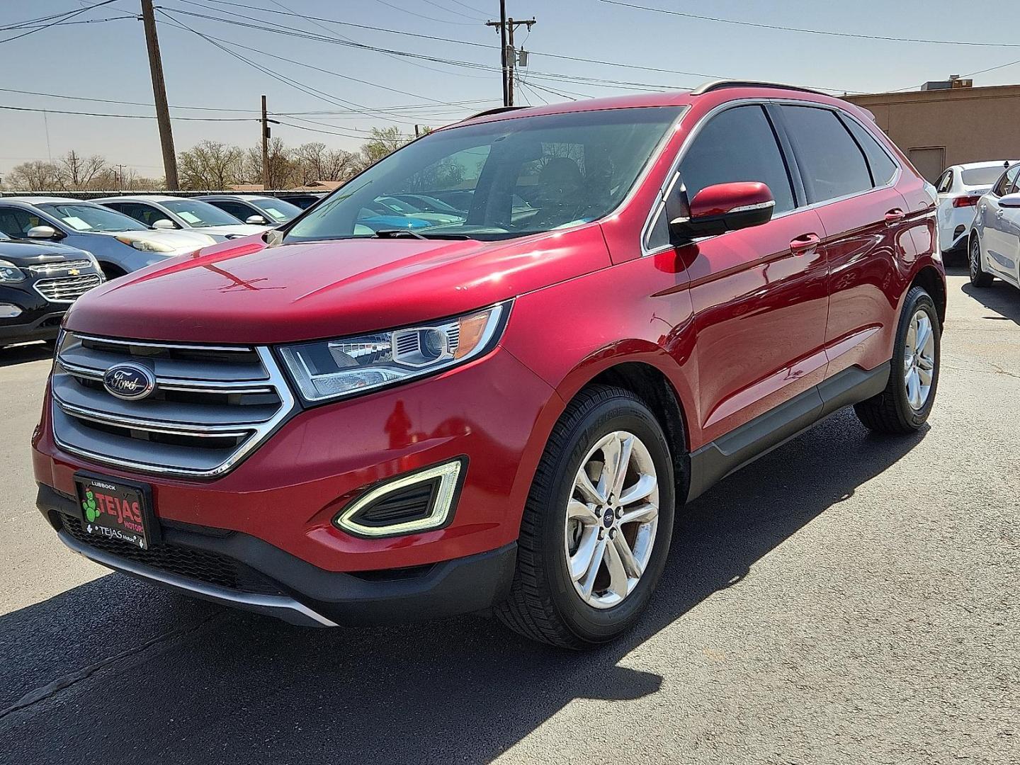 2016 RED /Dune - DD Ford Edge SEL (2FMPK3J97GB) with an EcoBoost 2L I-4 gasoline direct injection, DOHC, variable valve control, intercooled turbo, premium unleaded, engine with 245HP engine, located at 4110 Avenue Q, Lubbock, 79412, 33.556553, -101.855820 - Photo#1