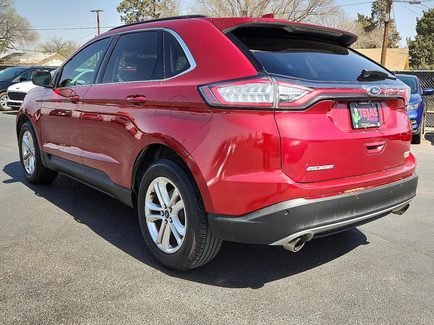 2016 RED /Dune - DD Ford Edge SEL (2FMPK3J97GB) with an EcoBoost 2L I-4 gasoline direct injection, DOHC, variable valve control, intercooled turbo, premium unleaded, engine with 245HP engine, located at 4110 Avenue Q, Lubbock, 79412, 33.556553, -101.855820 - Photo#2