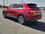 2016 Ruby Red Metallic Tinted Clearcoat - RR /Ebony - BE Lincoln MKX Reserve (2LMTJ8LR4GB) with an 3.7L V-6 DOHC, variable valve control, regular unleaded, engine with 303HP engine, located at 4110 Avenue Q, Lubbock, 79412, 33.556553, -101.855820 - Photo#2