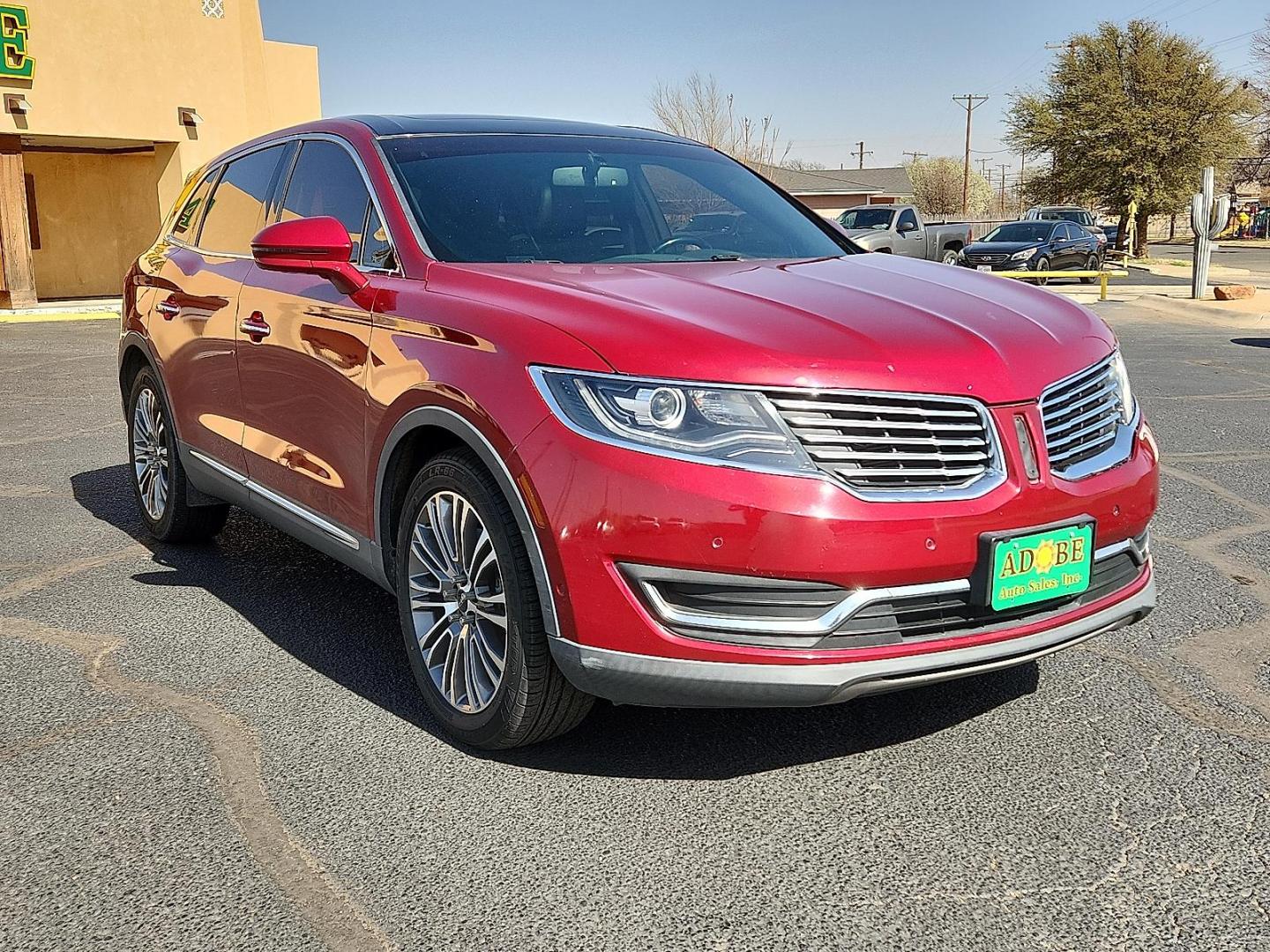 2016 Ruby Red Metallic Tinted Clearcoat - RR /Ebony - BE Lincoln MKX Reserve (2LMTJ8LR4GB) with an 3.7L V-6 DOHC, variable valve control, regular unleaded, engine with 303HP engine, located at 4110 Avenue Q, Lubbock, 79412, 33.556553, -101.855820 - Photo#5